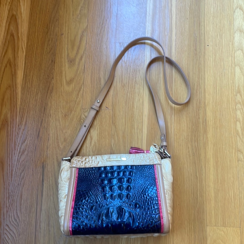 Like new Brahmin purse with duster bag.